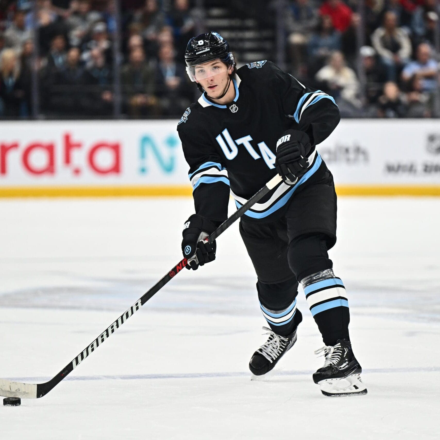 SALT LAKE CITY, UTAH - JANUARY 14: John Marino #6 of the Utah Hockey Club passes the puck during the first period of a game against the Montreal Canadiens on January 14, 2025 at Delta Center in Salt Lake City, Utah. (Photo by Jamie Sabau/NHLI via Getty Images)